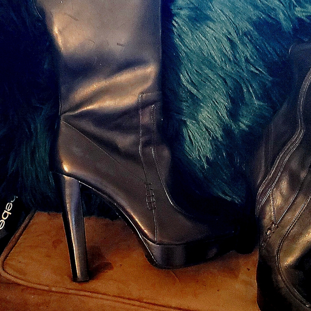 Black leather knee high boots